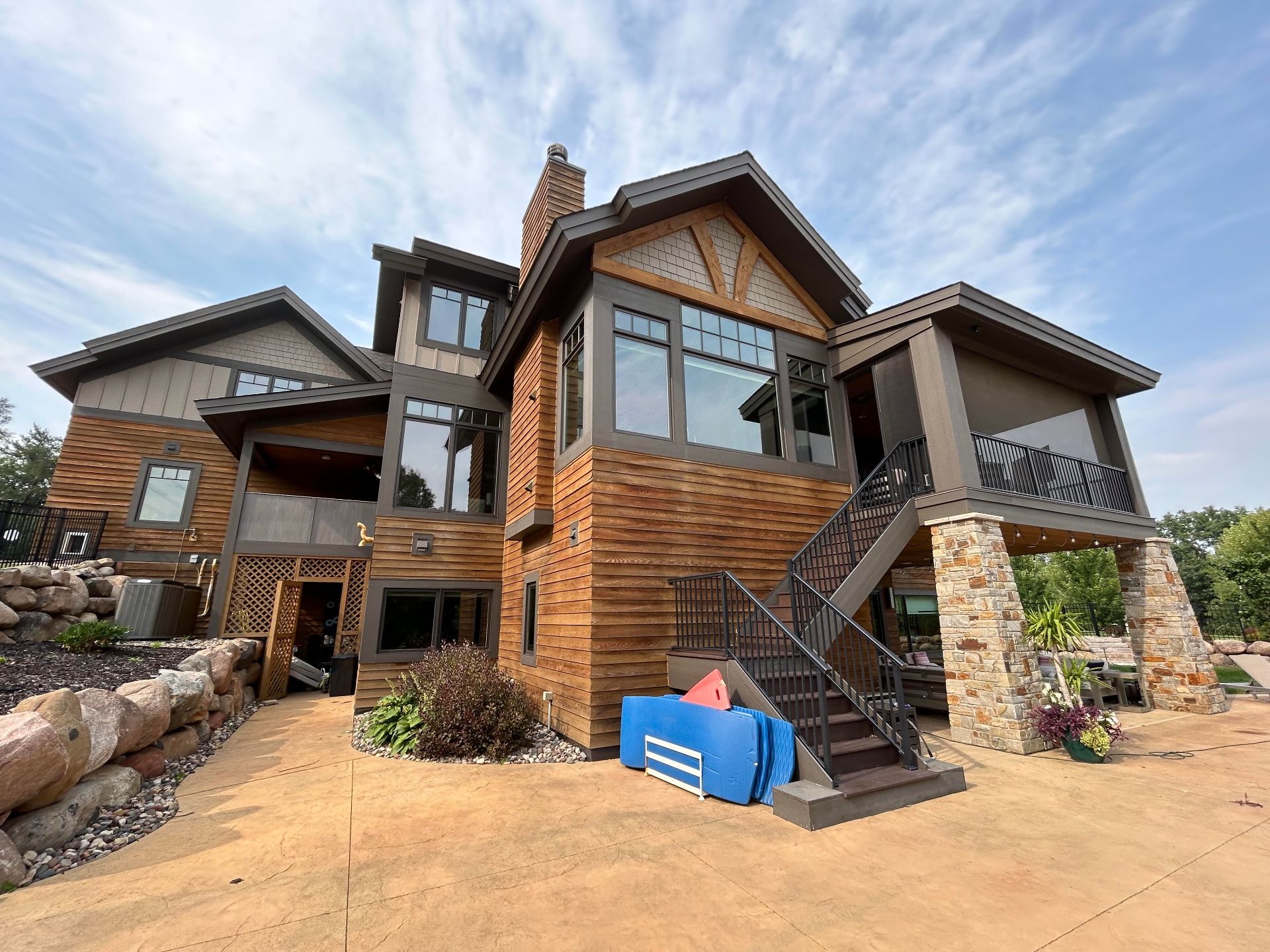Cedar-sided home with large clean windows